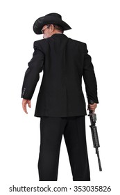 Back-shot Of A Western Style Hitman Standing With Gun In His Hand, Isolated On White Background