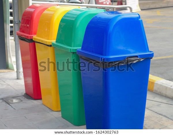 Backside of \
Colorful Recycle Bins For Collection Of Recycle Materials in public\
car parking Bangkok ,\
Thailand.