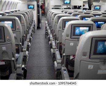 Backside Of Seat In A Plane After Passenger Leaves, Select Focus