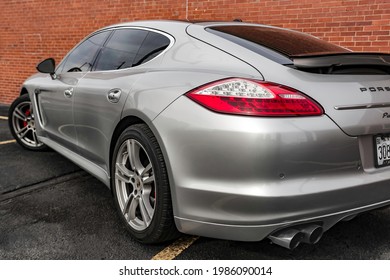 Backside of Silver Porsche Panamera