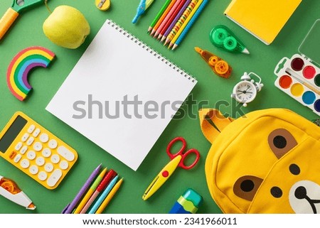Back-to-school essentials: A vibrant top-view image featuring a green chalkboard backdrop with notepad, collection of school supplies and backpack perfect for promoting education-related campaigns