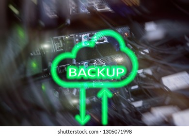 Backup button on modern server room background. Data loss prevention. System recovery.