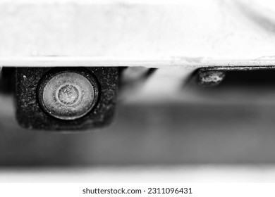 Backup camera on a vehicle obscured with dirt, mud, and dust so that the driver cannot see.  - Shutterstock ID 2311096431
