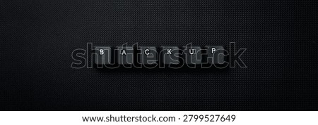 Backup Data Storage Concept With Keyboard Keys On Dark Background