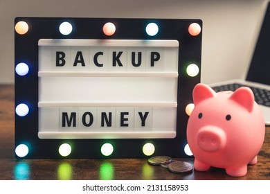 Backup Money Phrase Spelled On Marquee Lightbox - Savings Concept. High Quality Photo