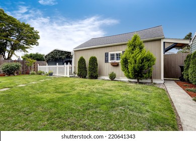 Backyard Area With Covered Parking Spot And Shed. Backyard Landscape Design