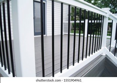 Backyard Composite Deck Rail Closeup - Shutterstock ID 1551904961
