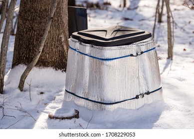 Backyard Compost Bin In Winter With Insulation In The Snow