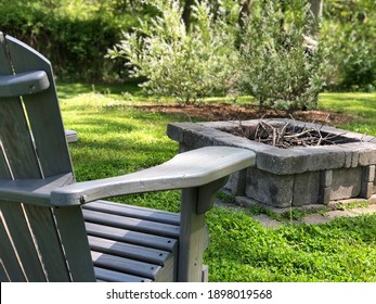 Backyard Fire Pit With Adirondack Chair Summer Scene