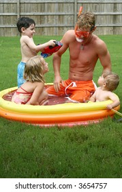 Backyard Fun With The Family In The Kiddie Pool