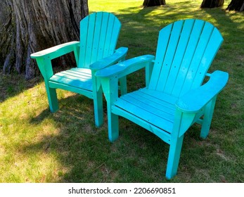 A Backyard Lounge Chairs Shady Relaxing Green Old Chair Seating Yard Grass Shade Trees Retro Design Vintage Style Wood Beach Outdoors Blue Armchair Grass Lawn