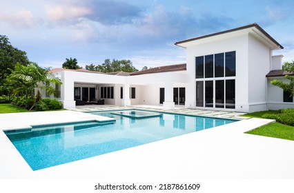 Backyard of a modern house with swimming pool - Powered by Shutterstock