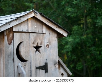 Backyard Outhouse With Bird House
