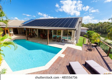 Backyard with swimming pool in stylish home - Shutterstock ID 485556736