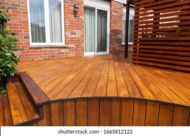 Backyard Wooden Deck Floor Boards With Fresh Brown Stain, Angled View