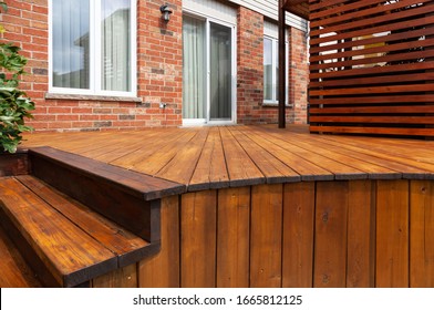 Backyard Wooden Deck Floor Boards With Fresh Brown Stain, Angled View