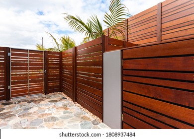 Backyard with wooden wall of modern house - Shutterstock ID 1808937484
