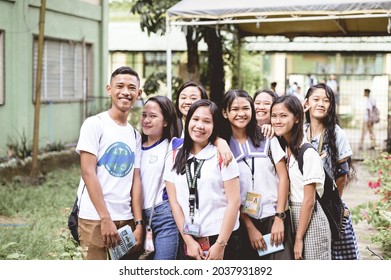 BACOLOD, PHILIPPINES - Mar 01, 2019: A group of Filipino high school students gathering for a corporate speech