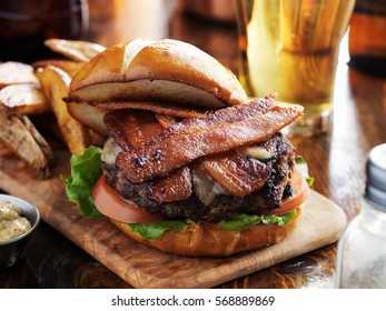 Bacon Burger With Pretzel Bun And Beer