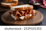 Bacon Butty - Sandwich filled with crispy bacon, often on buttered bread.