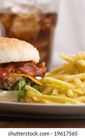 Bacon Cheeseburger With Fries And Coke