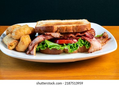 Bacon Lettuce  Tomato  Sandwich   Served With Broccoli Tots, 