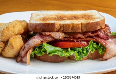 Bacon Lettuce  Tomato  Sandwich   Served With Broccoli Tots,