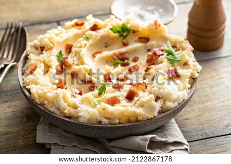 Bacon mashed potatoes with cheddar cheese and fresh parsley
