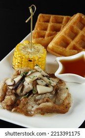 Bacon With Mushroom Gravy Dish With Corn, Waffles And Syrup