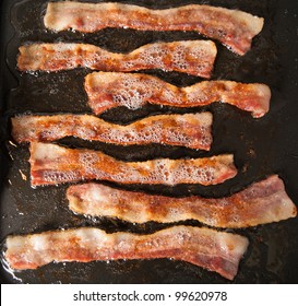 Bacon Sizzling On Skillet