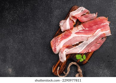 bacon strips fresh meat healthy meal food snack on the table copy space food background rustic top view - Powered by Shutterstock