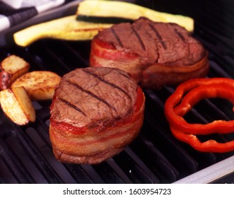 Bacon Wrapped Fillet Mignon On The Grill.