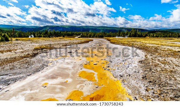 The Bacterial Mat\
in the drain channel of the Grand Geyser in the Upper Geyser Basin\
along the Continental Divide Trail in Yellowstone National Park,\
Wyoming, United States