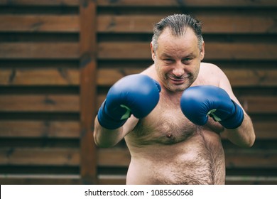 Bad Big Fat Boxer With Blue Gloves