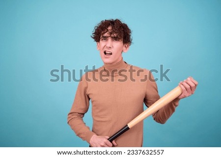 Bad boy posing in studio for halloween.