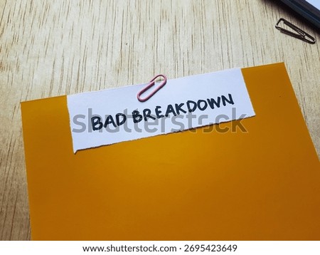 bad breakdown writting on table background.