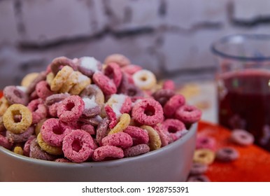 Bad Breakfast Of Colorful Cereals Full Of Sugar With Red Fruit Juice