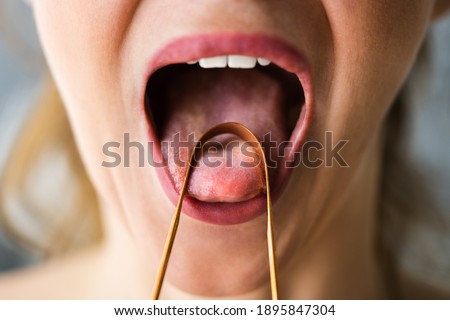 Bad Breath Tongue Scraper Or Brush Cleaner