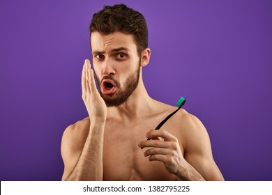 Bad Breath. Young Handsome Man Checking His Breath With His Hand., Blowing To It In The Morning. Bad Smell From The Mouth, Toothache, Guy Having Problems With Teeth