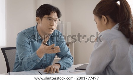 Bad colleagues work argue point face stress rude yelling anger hate speech at female coworker. Two adult asia people man woman fight on meeting at office upset mad bossy male worker. Career job issue.