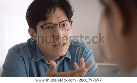 Bad colleagues work argue point face stress rude yelling anger hate speech at female coworker. Two adult asia people man woman fight on meeting at office upset mad bossy male worker. Career job issue.