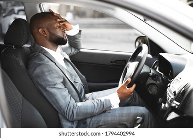 Bad Day. Exhausted African American Entrepreneur On A Way Home, Driving Car