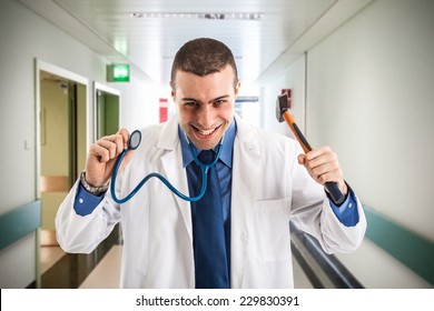 Bad Doctor Holding An Hammer