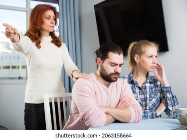 Bad Domestic Quarrel Between Family Members At Home. High Quality Photo