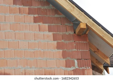 A Bad Example Of Masonry, Bricklaying, Using Wet Bricks Under The Roofing Construction. 