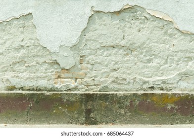 Bad House Foundation Base With Damaged Bricks Cracked Plaster Wall Texture