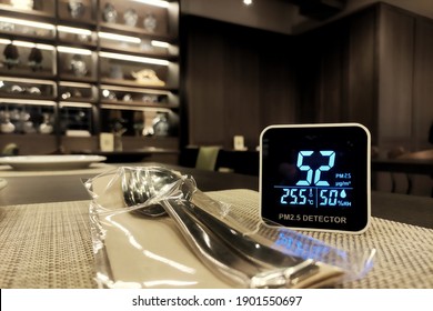 Bad Indoor Air Quality. Small Pm 2.5 Sensor Detect Harmful Amount Of Small Dust Particulate Matter In A Restaurant. Enclosed Space Is Not Safe From Harmful Small Dust. 