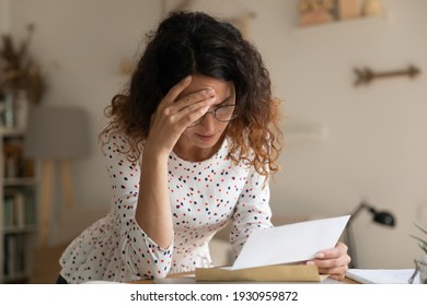 Bad News. Confused Young Female Wearing Glasses Open Mortgage Loan Rejection Letter Official Refusal From Bank Credit Organization. Upset Woman Small Business Owner Get Paper Notice About Tax Debt