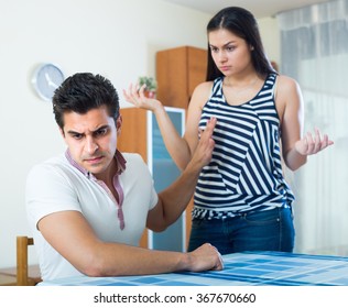 Bad Quarrel Between Offended Husband And Young Wife At Home 