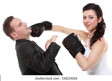 Bad Relationship. Funny Wedding Couple Expressive Fighting. Woman Showing Her Husband Who's Boss. Angry Wife Boxing Husband. Isolated On White